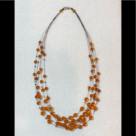 Jewelry - 💥HP💥Genuine SS Amber Floating Necklace